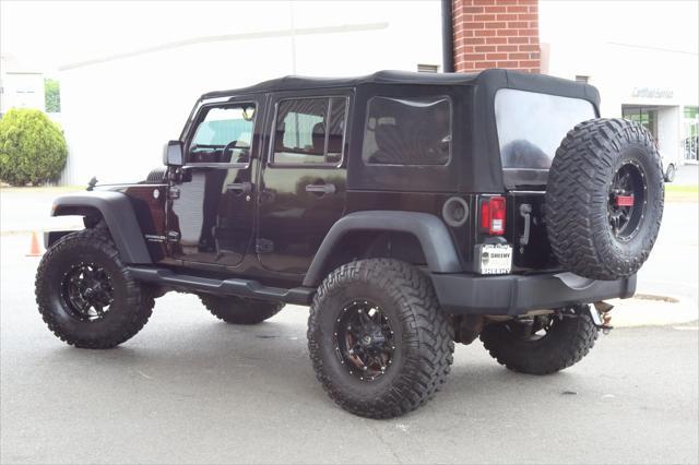 used 2014 Jeep Wrangler Unlimited car, priced at $19,988