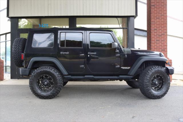 used 2014 Jeep Wrangler Unlimited car, priced at $19,988