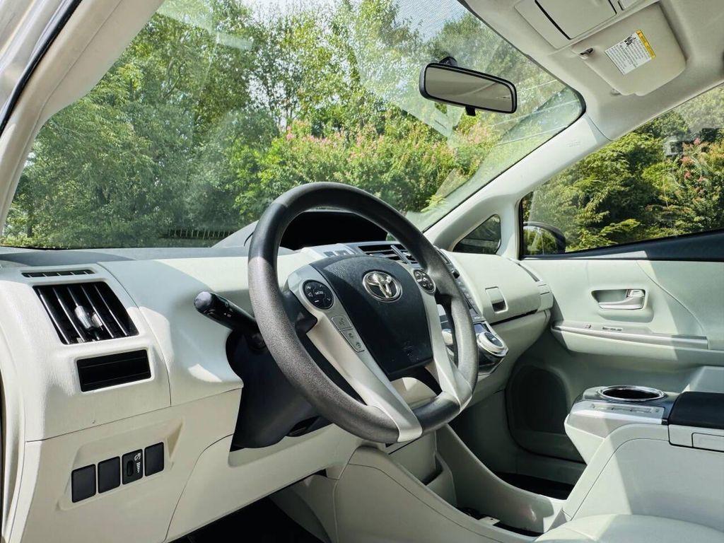 used 2014 Toyota Prius v car, priced at $7,999