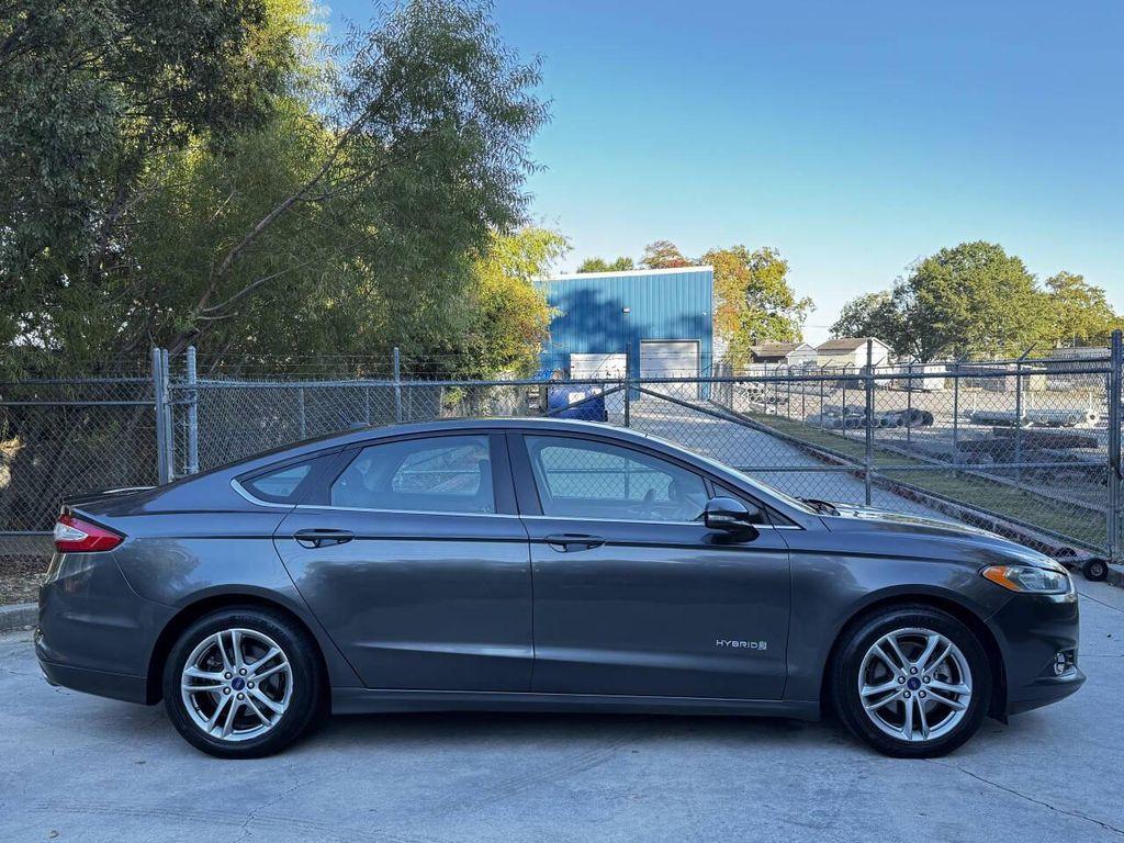 used 2016 Ford Fusion Hybrid car, priced at $5,500