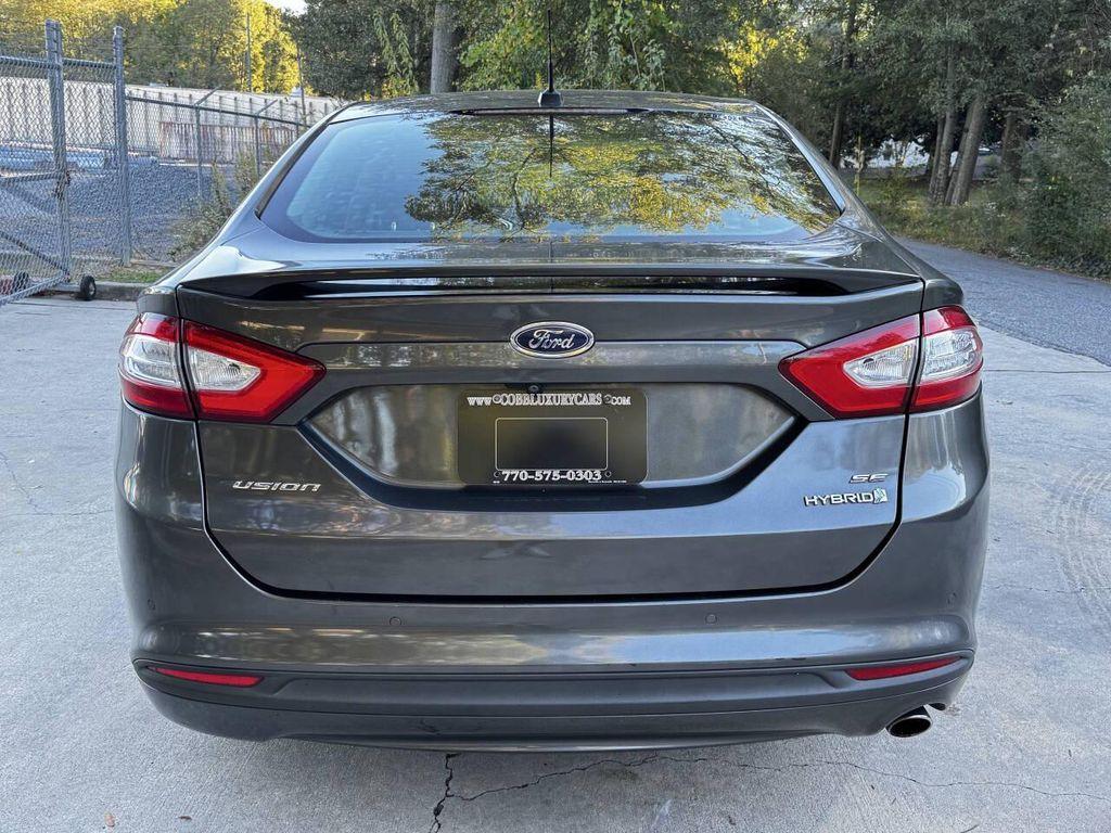 used 2016 Ford Fusion Hybrid car, priced at $5,500