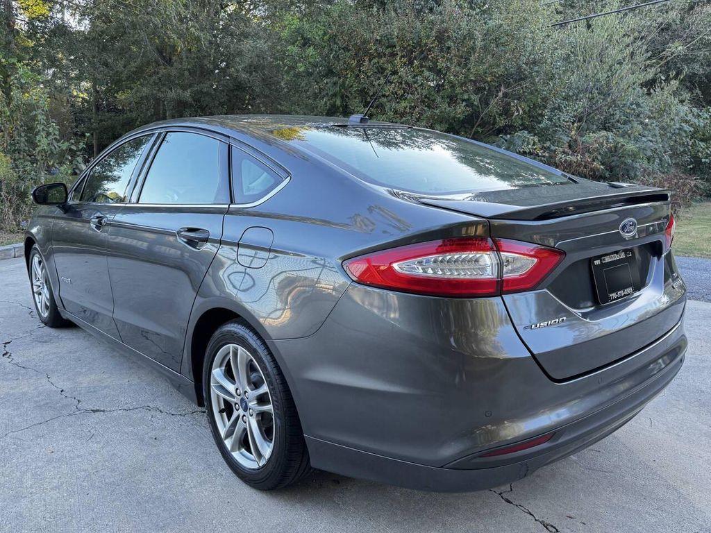 used 2016 Ford Fusion Hybrid car, priced at $5,500