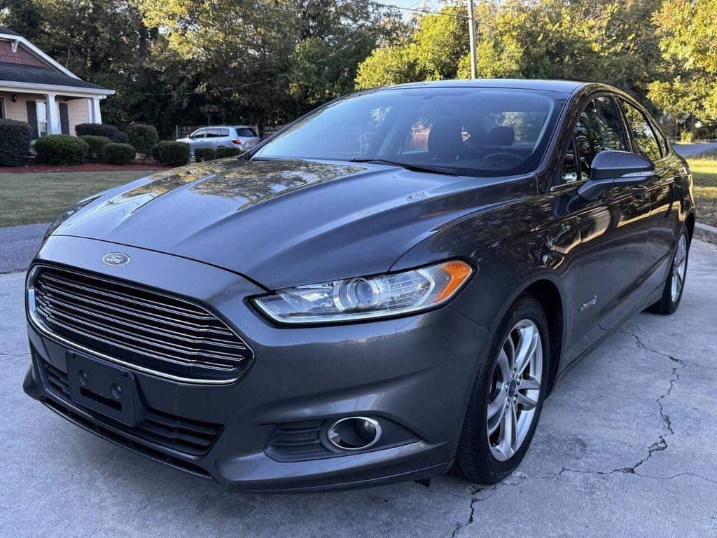 used 2016 Ford Fusion Hybrid car, priced at $5,500