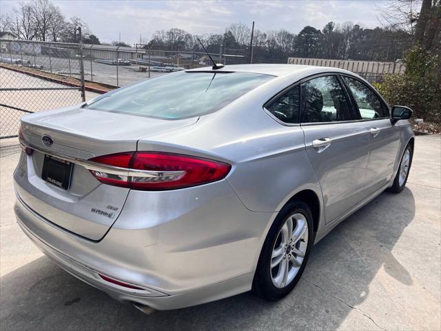 used 2018 Ford Fusion Hybrid car, priced at $8,500