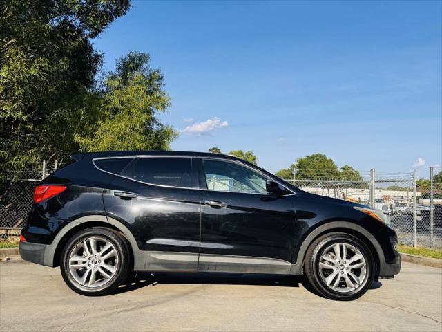 used 2013 Hyundai Santa Fe car, priced at $6,999