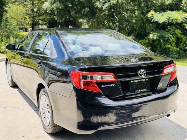 used 2014 Toyota Camry car, priced at $9,811