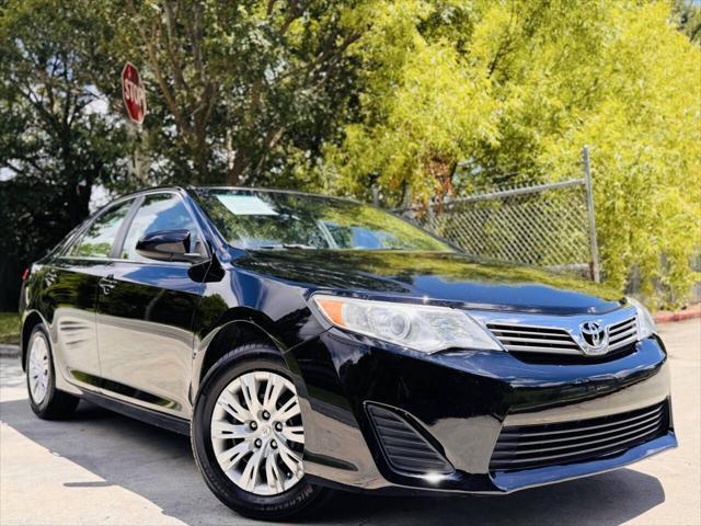 used 2014 Toyota Camry car, priced at $9,811