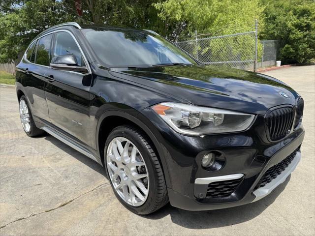 used 2018 BMW X1 car, priced at $13,999