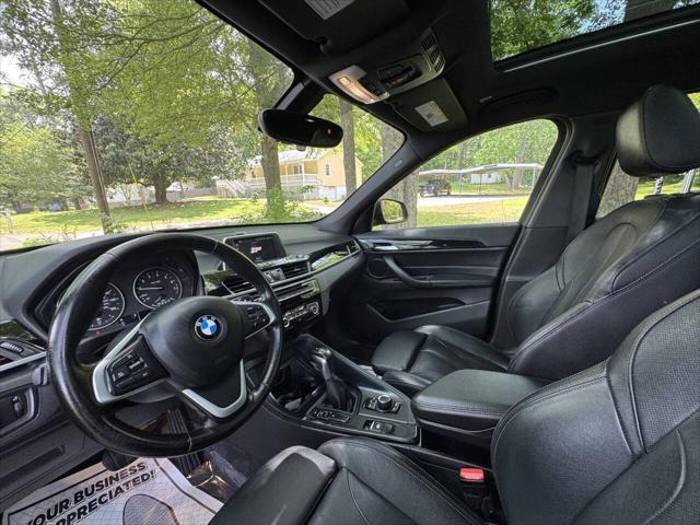 used 2018 BMW X1 car, priced at $13,999