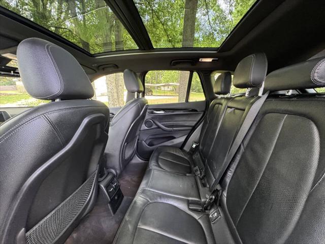 used 2018 BMW X1 car, priced at $13,999