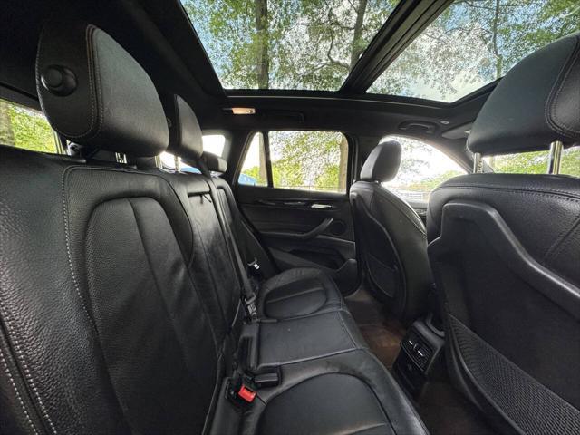 used 2018 BMW X1 car, priced at $13,999