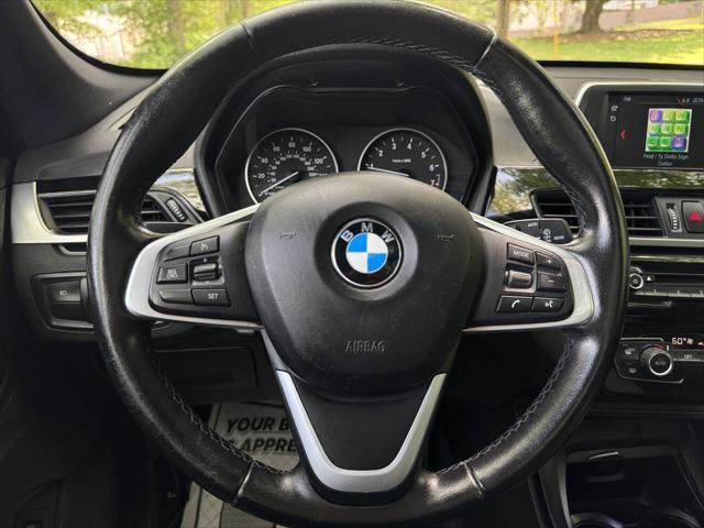 used 2018 BMW X1 car, priced at $13,999
