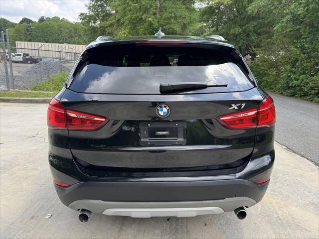 used 2018 BMW X1 car, priced at $13,999