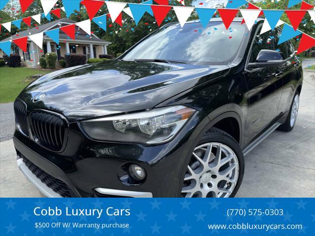 used 2018 BMW X1 car, priced at $12,500