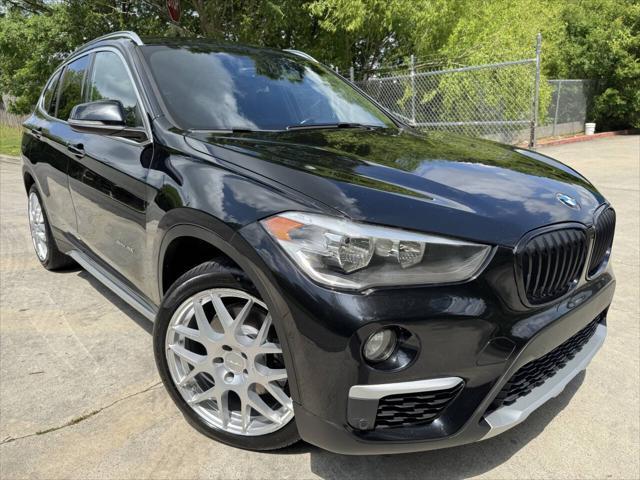 used 2018 BMW X1 car, priced at $13,999