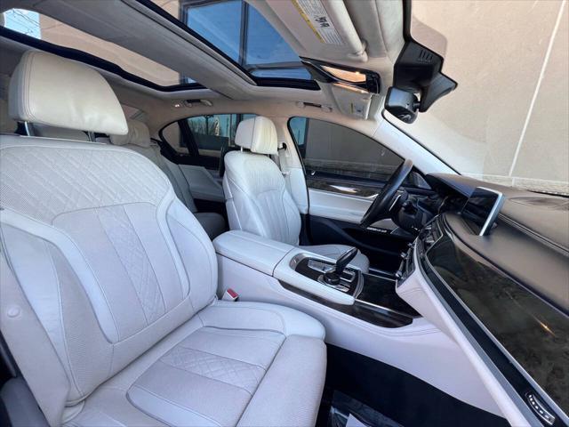 used 2016 BMW 750 car, priced at $18,500