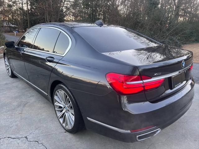 used 2016 BMW 750 car, priced at $18,500