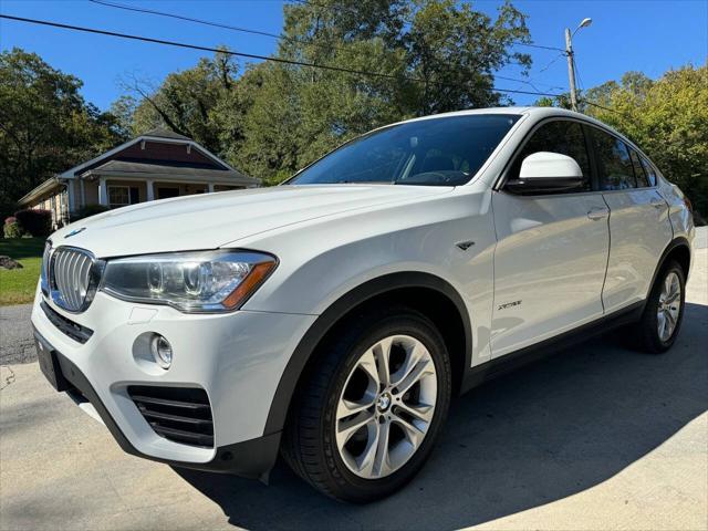 used 2016 BMW X4 car, priced at $13,999