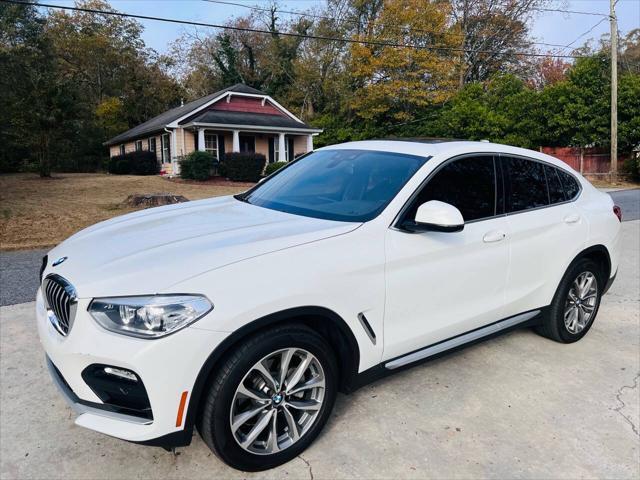 used 2019 BMW X4 car, priced at $19,000