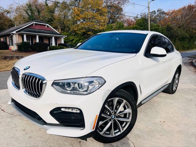 used 2019 BMW X4 car, priced at $19,000