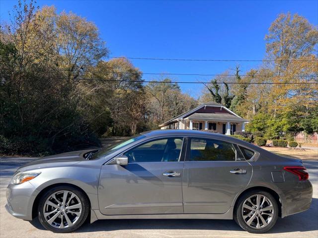 used 2018 Nissan Altima car, priced at $7,999