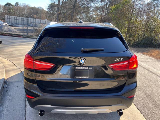 used 2018 BMW X1 car, priced at $11,436