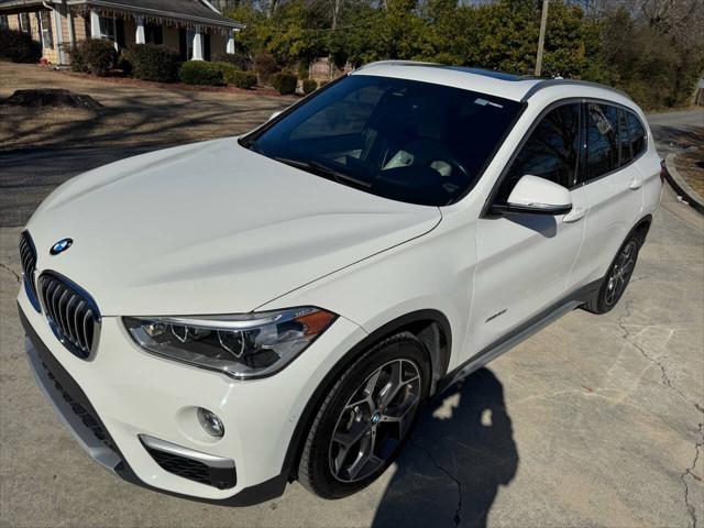 used 2016 BMW X1 car, priced at $13,999