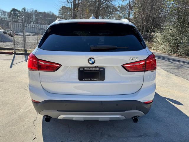 used 2016 BMW X1 car, priced at $13,999