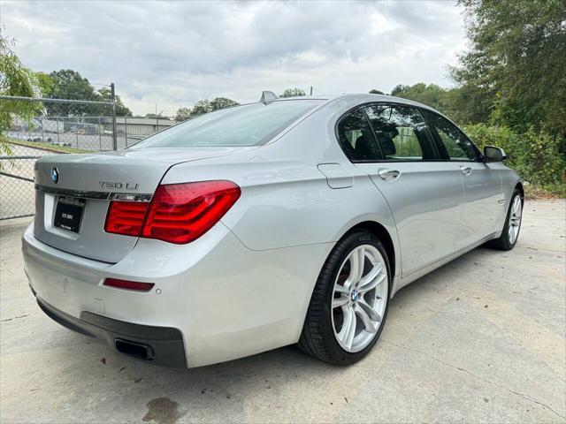 used 2012 BMW 750 car, priced at $8,999