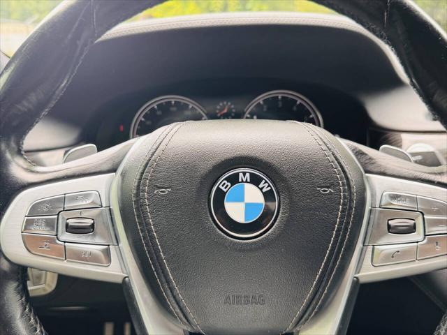 used 2018 BMW 750 car, priced at $18,497