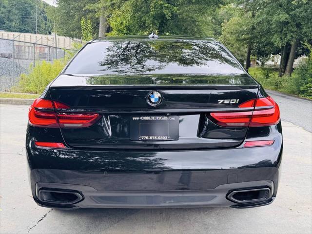 used 2018 BMW 750 car, priced at $18,497
