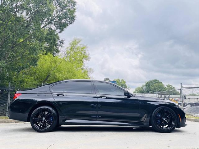used 2018 BMW 750 car, priced at $18,497