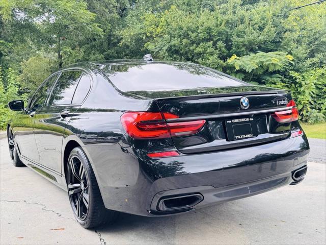 used 2018 BMW 750 car, priced at $18,497
