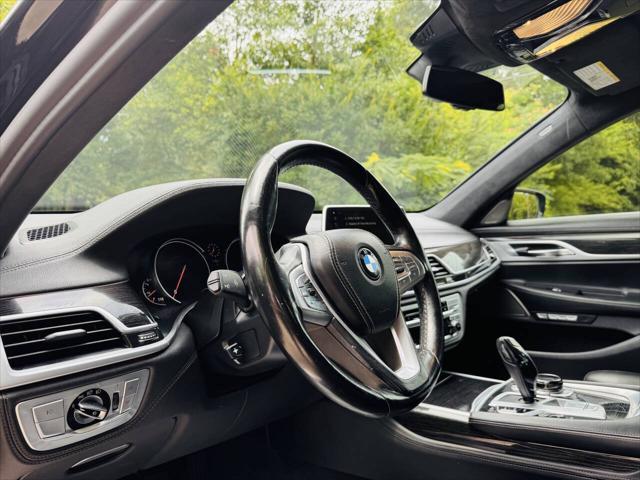 used 2018 BMW 750 car, priced at $18,497