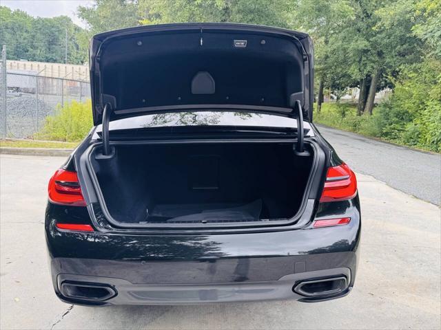used 2018 BMW 750 car, priced at $18,497