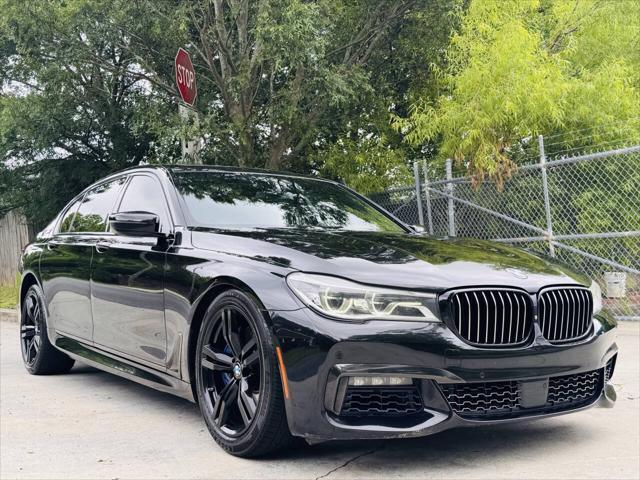 used 2018 BMW 750 car, priced at $18,497