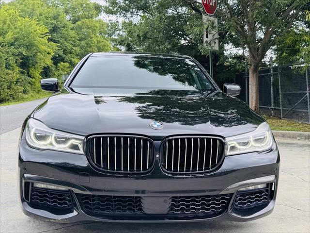 used 2018 BMW 750 car, priced at $18,497