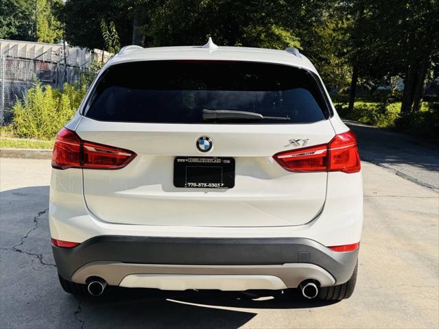 used 2018 BMW X1 car, priced at $11,000