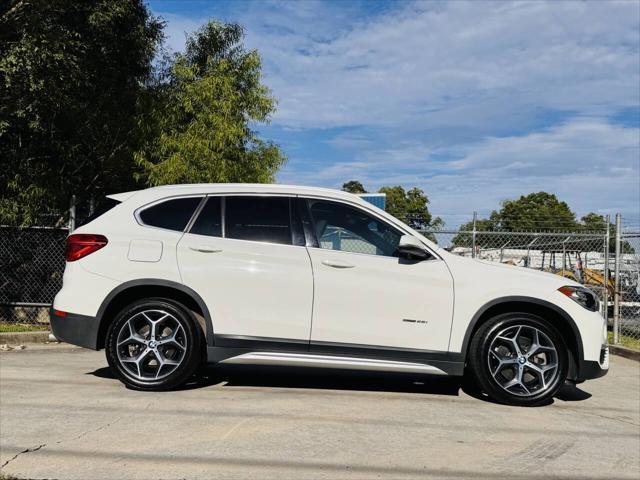 used 2018 BMW X1 car, priced at $11,000