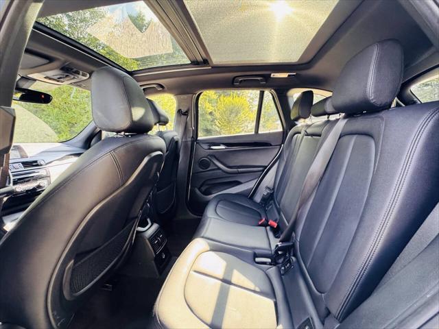 used 2018 BMW X1 car, priced at $11,000