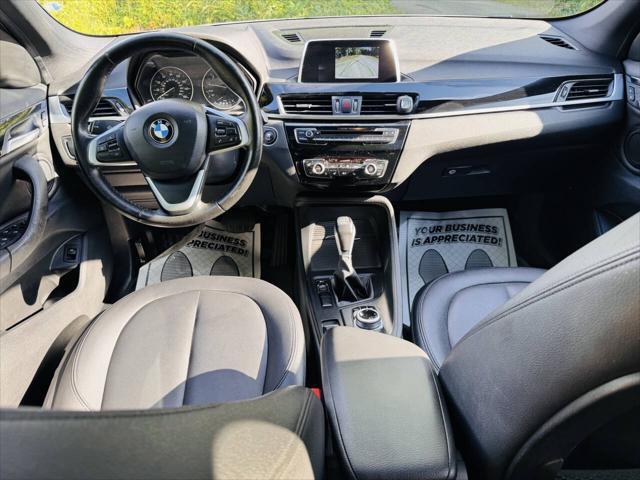 used 2018 BMW X1 car, priced at $11,000