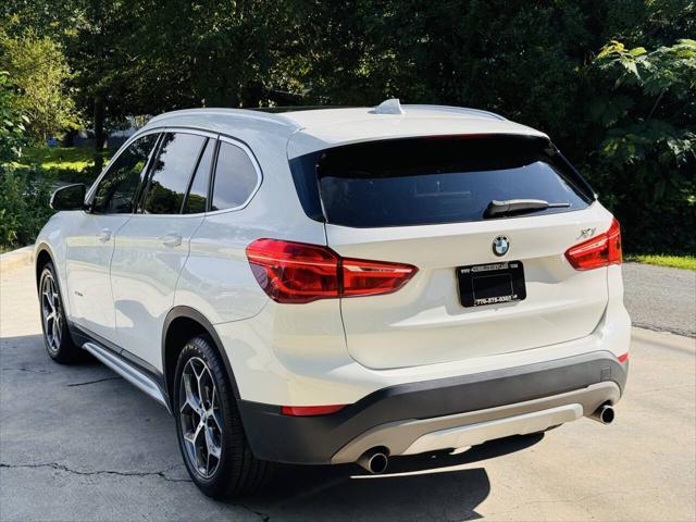 used 2018 BMW X1 car, priced at $11,000