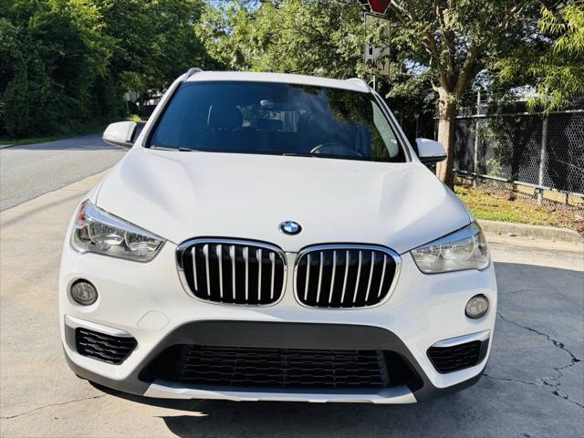 used 2018 BMW X1 car, priced at $11,000