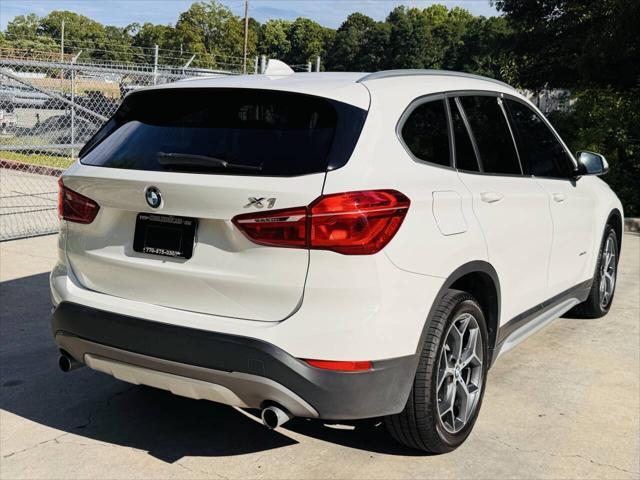 used 2018 BMW X1 car, priced at $11,000