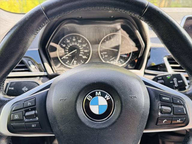 used 2018 BMW X1 car, priced at $11,000