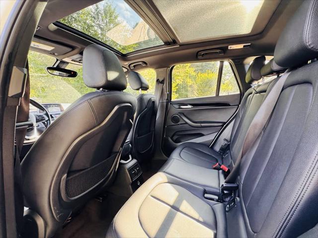 used 2018 BMW X1 car, priced at $11,000