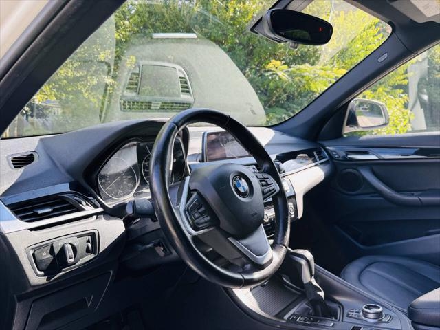 used 2018 BMW X1 car, priced at $11,000