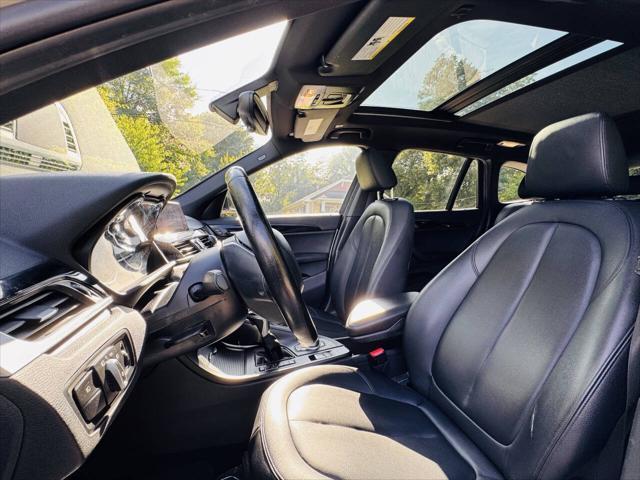 used 2018 BMW X1 car, priced at $11,000