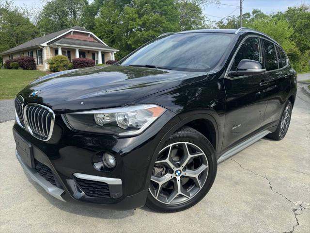 used 2018 BMW X1 car, priced at $13,999