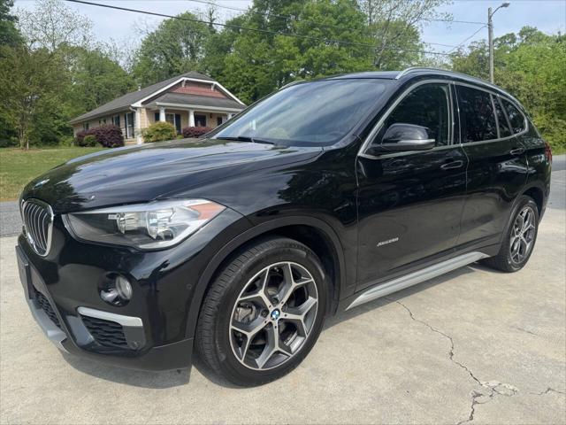 used 2018 BMW X1 car, priced at $13,999